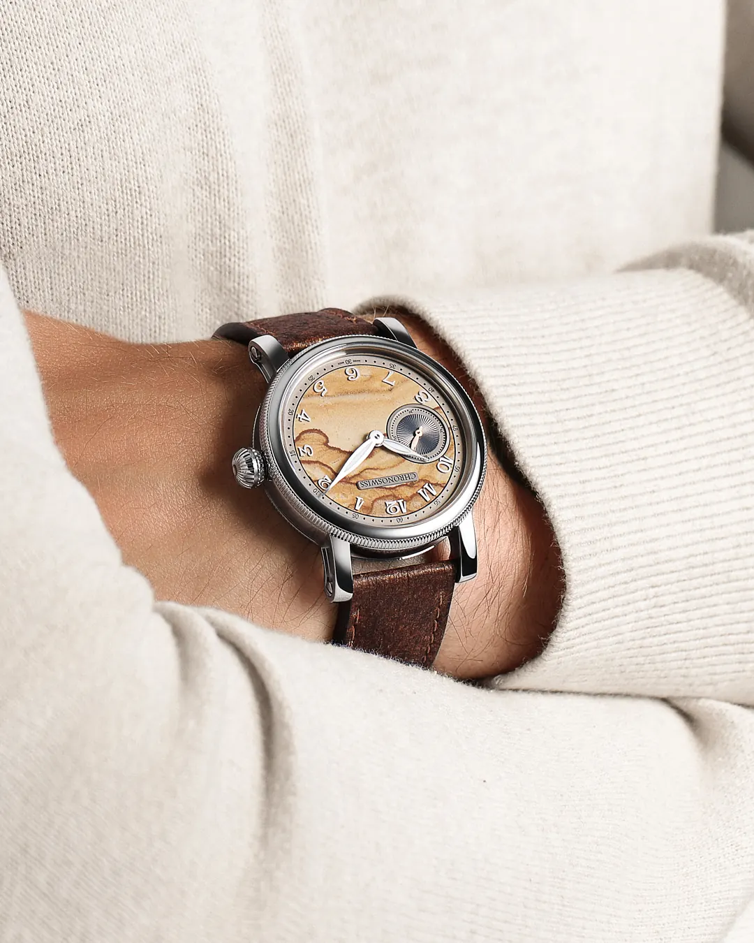 Chronoswiss Calibre C.6000 automatic movement with skeletonised tungsten rotor through sapphire caseback