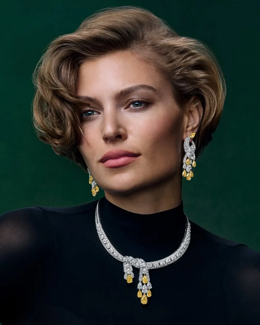 Oval Fancy Intense Yellow diamonds set within the Graff Tilda's Bow High Jewellery necklace