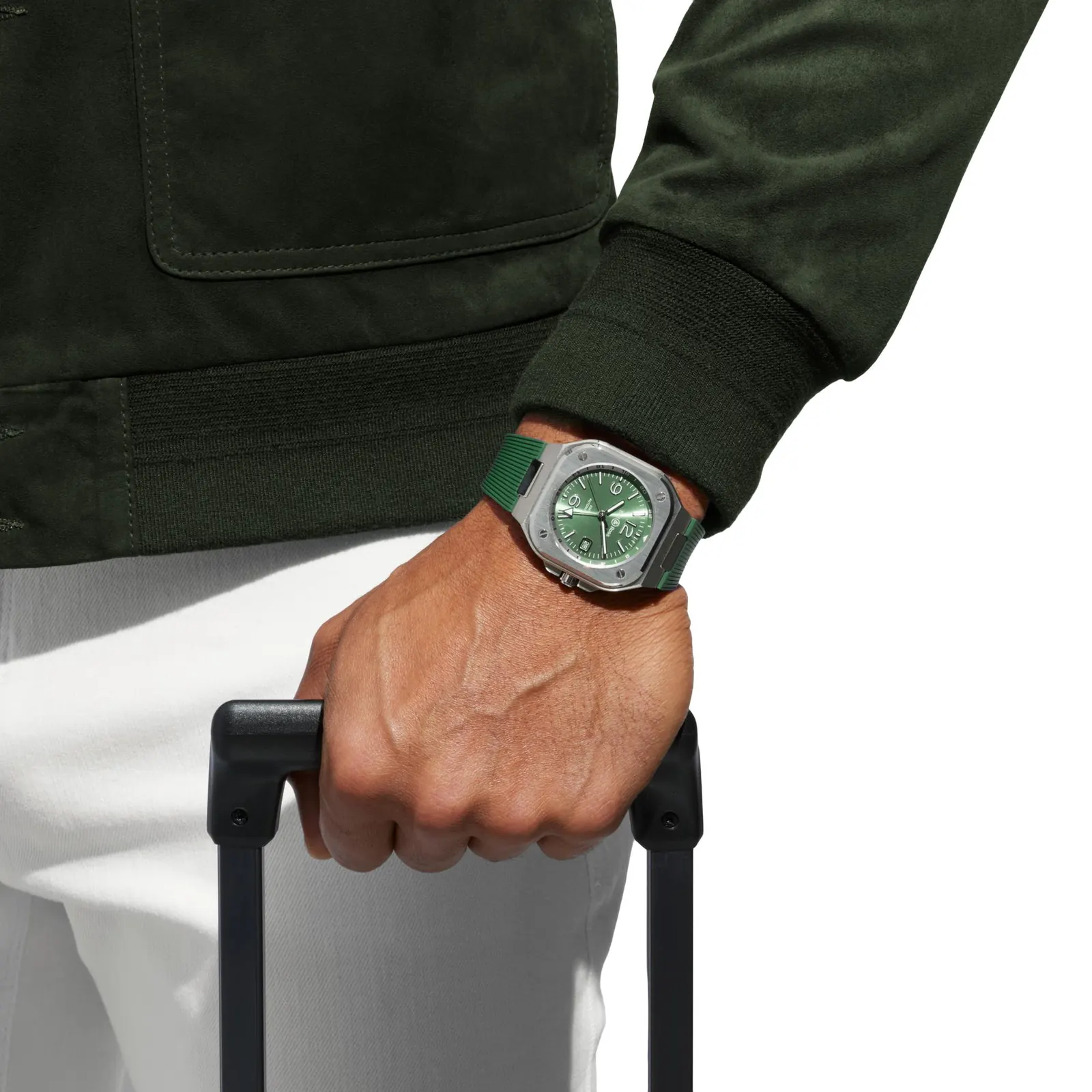 Bell & Ross BR-05 GMT Green Steel on green rubber strap, wrist shot urban setting