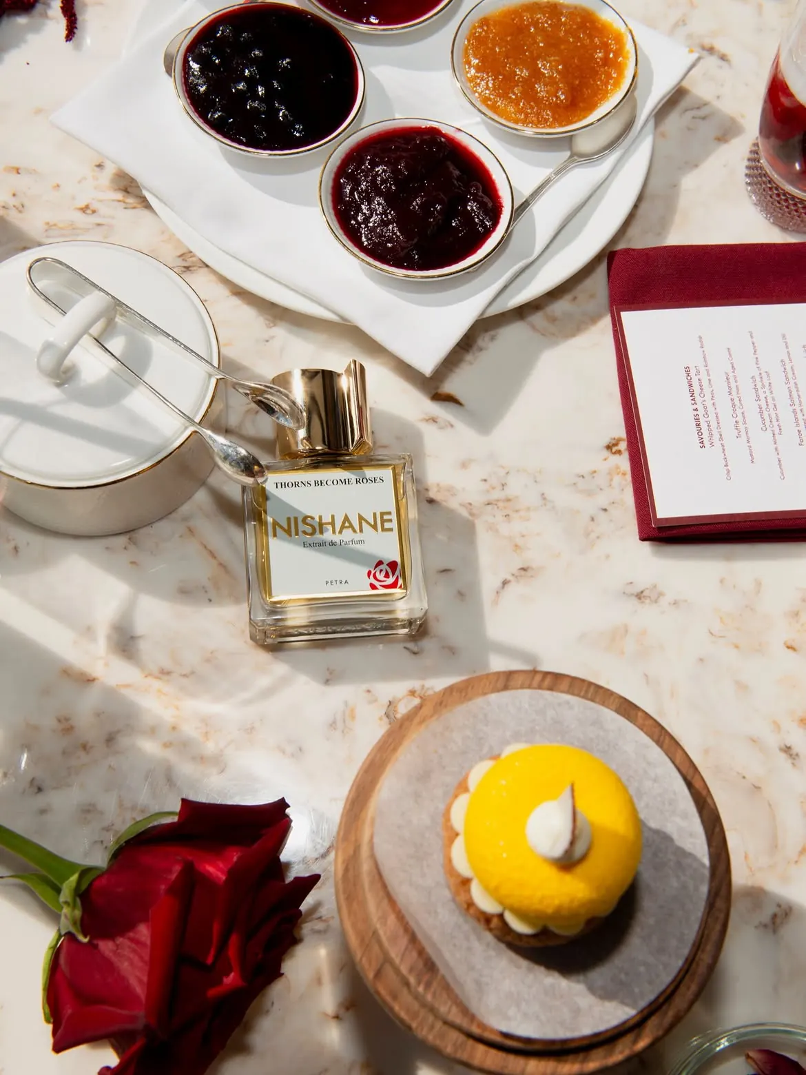 NISHANE Thorns Become Roses fragrance displayed at the Harrods Georgian Terrace