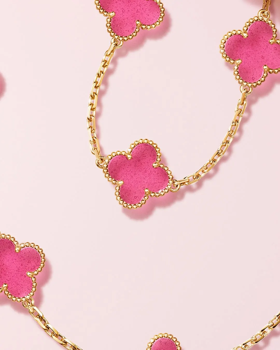 Van Cleef and Arpels Vintage Alhambra pink enamel pendant in 18K yellow gold
