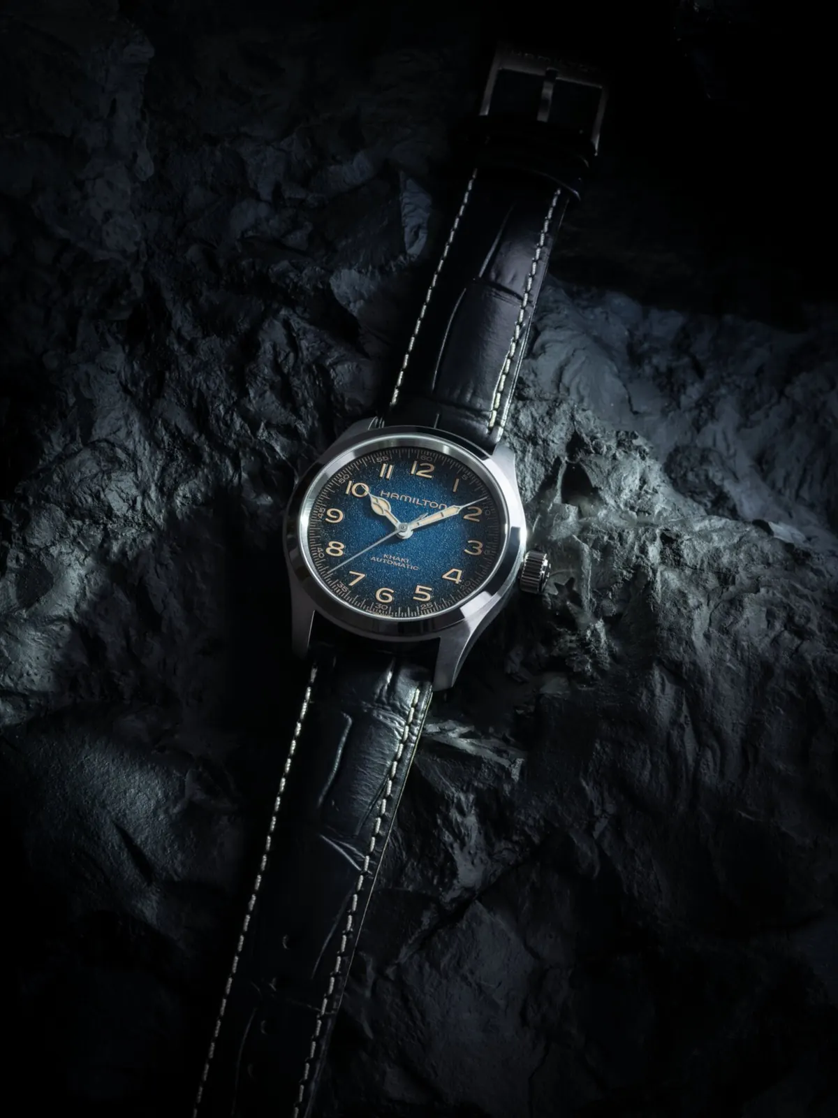 Hamilton Khaki Field Blue Murph 38mm showing the cosmic gradient dial with stainless steel bracelet