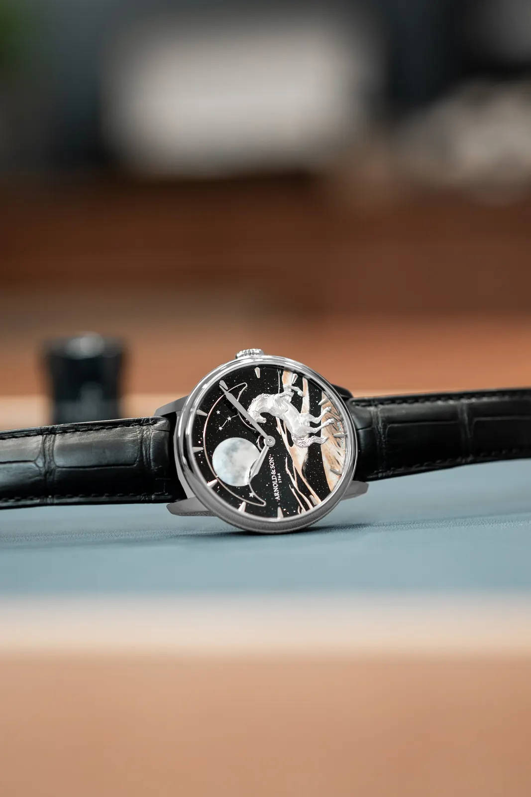 Arnold & Son Perpetual Moon 41.5 Platinum Horse of the Dunes dial with hand-engraved white gold horse on aventurine glass