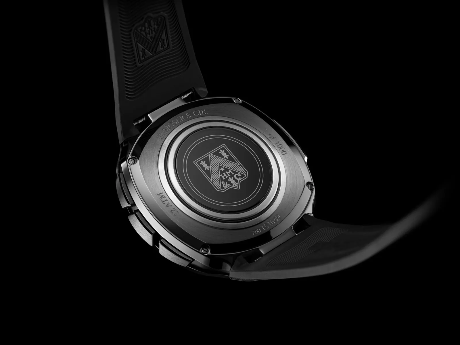 H. Moser & Cie. Off-Grid 6DI0-1202 blue PVD steel case with Blackor fumé skeleton dial and white rubber strap