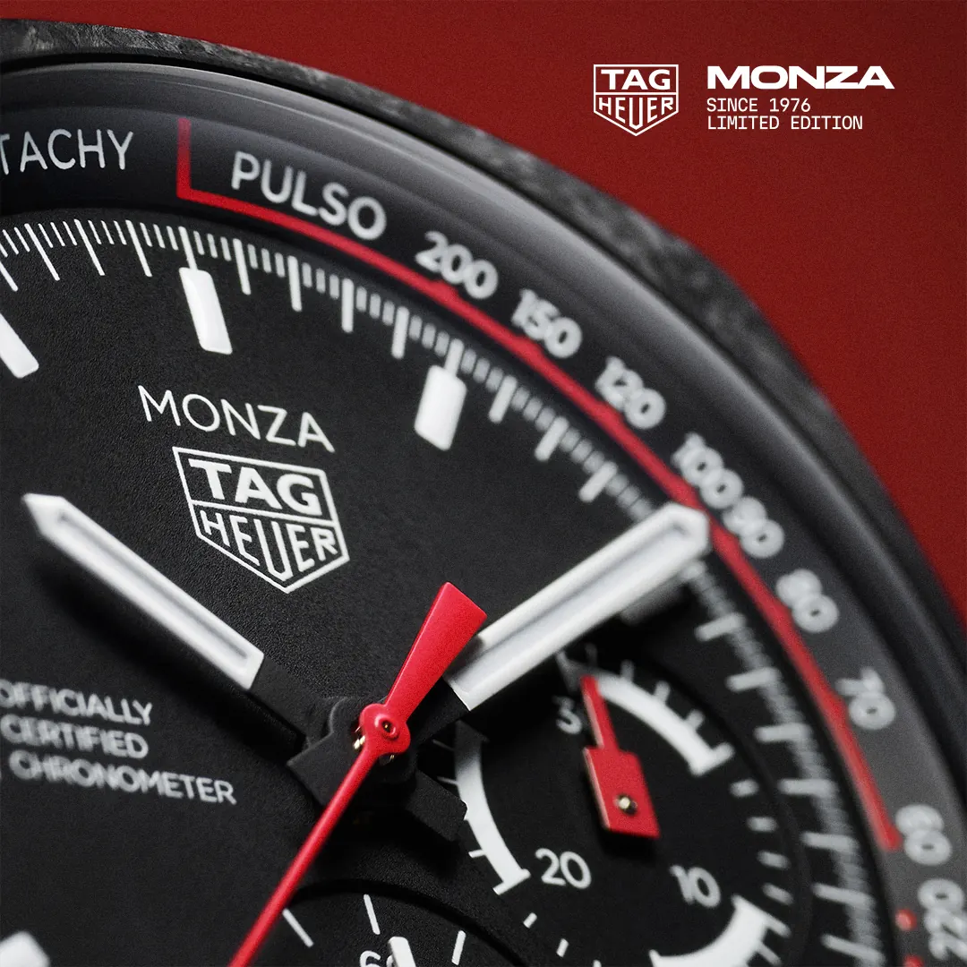 TAG Heuer Monza Flyback Chronograph black dial with tachymeter and pulsometer flange, red accents