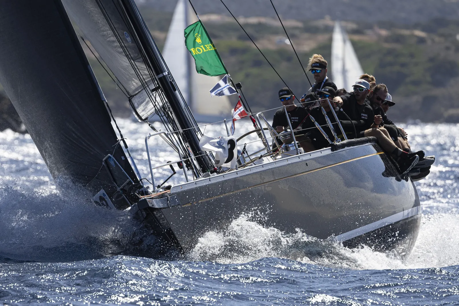 Crews celebrating ashore at the Yacht Club Costa Smeralda Rolex Swan Cup