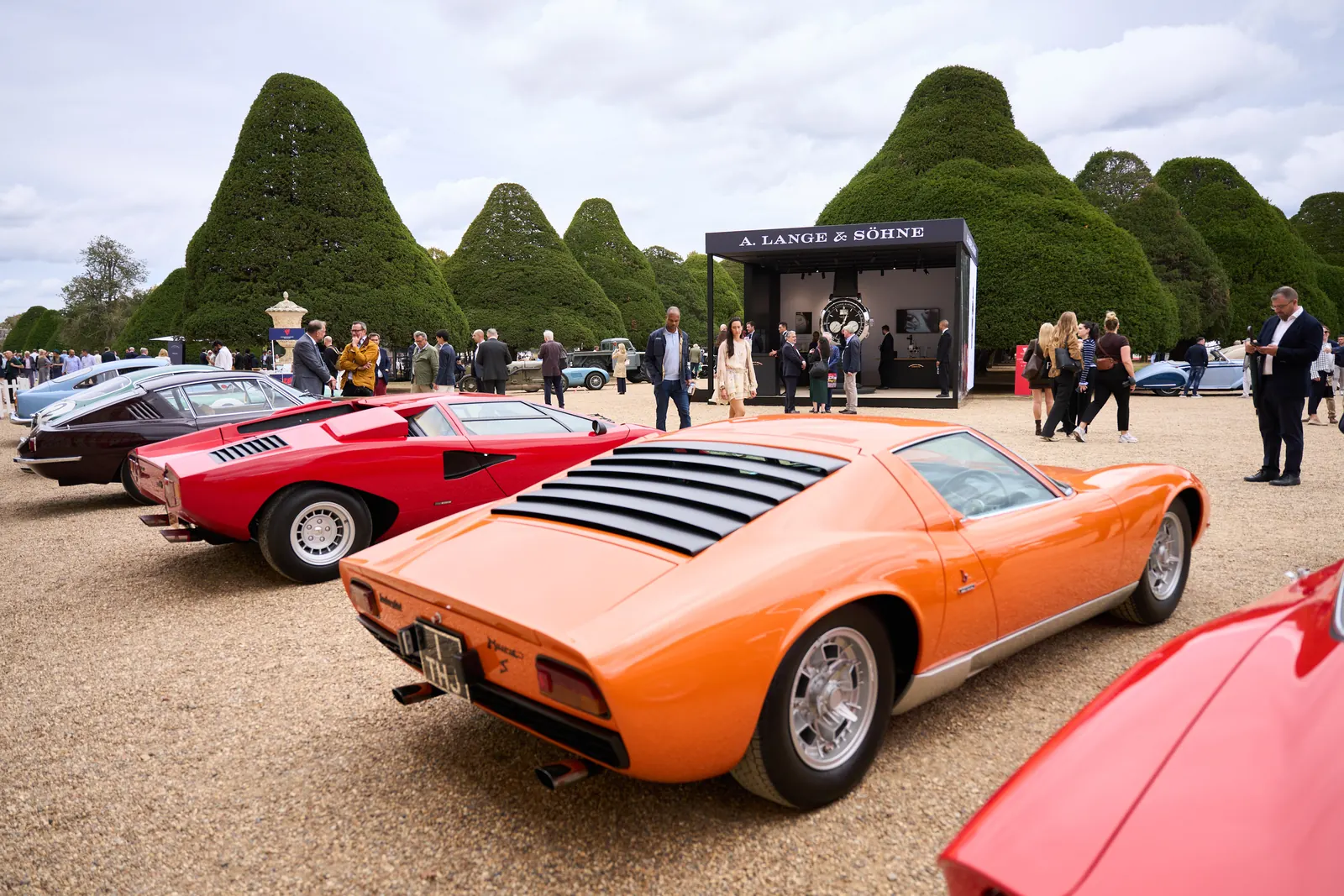 Classic cars and A. Lange & Söhne watches displayed at Hampton Court Palace gardens