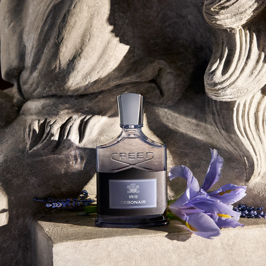 Creed Iris Debonair fragrance flacon with iris flowers
