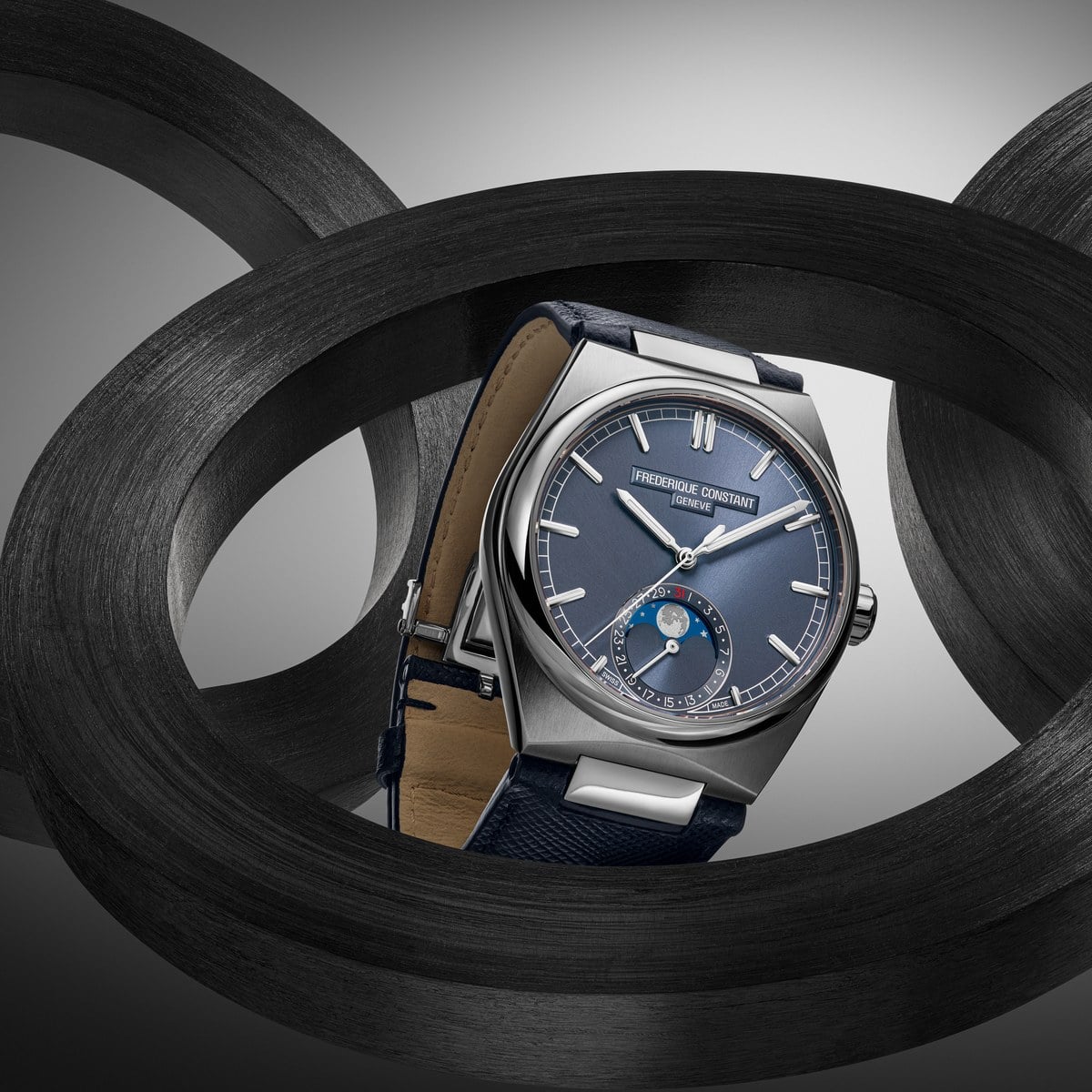 Frederique Constant Highlife Moonphase Date Manufacture with midnight-blue dial on blue Saffiano strap, official press image