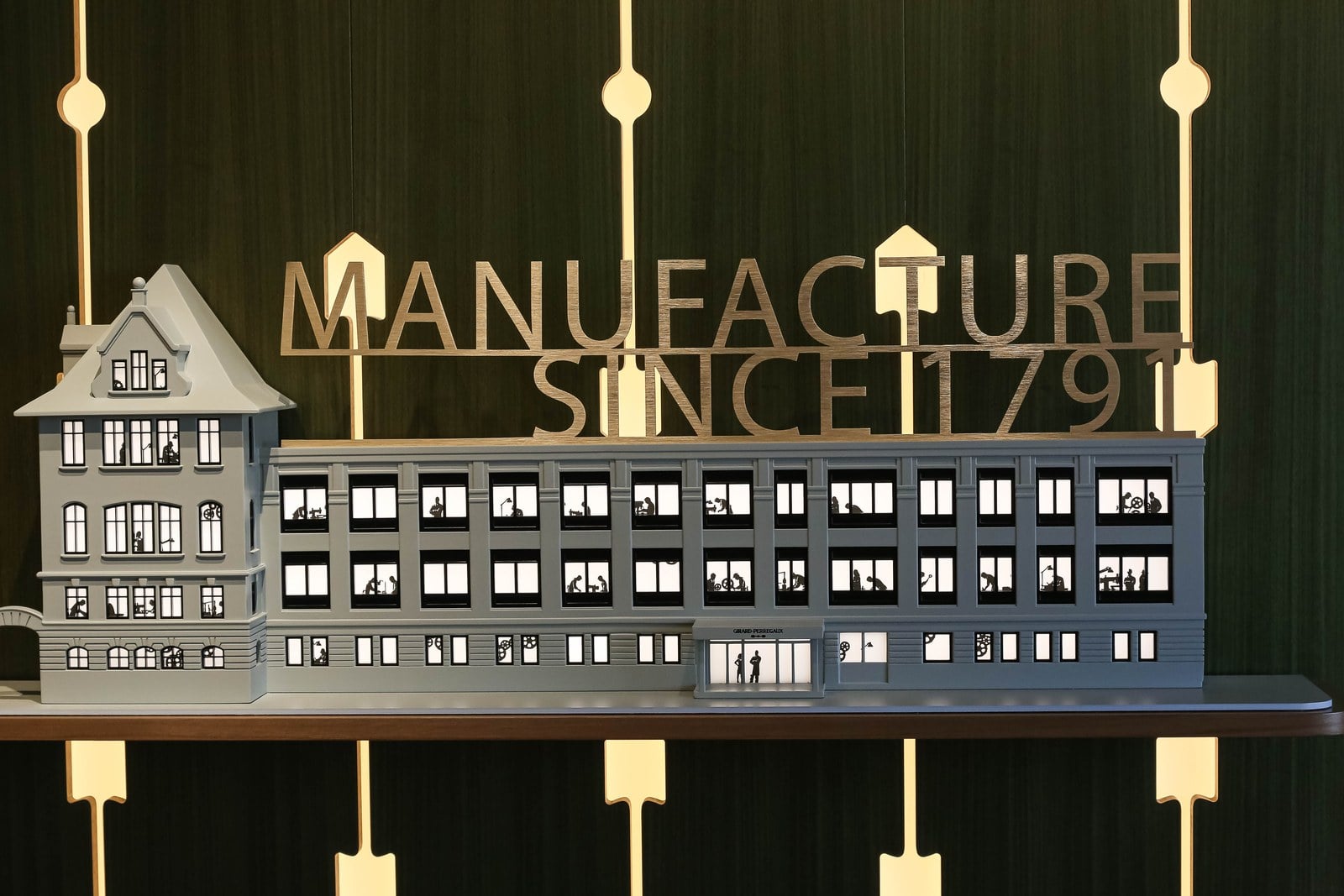Model of the Girard-Perregaux manufacture with the lettering Manufacture since 1791