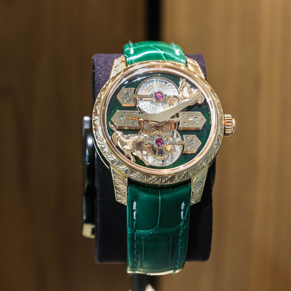Girard-Perregaux Three Bridges in pink gold on a green alligator strap