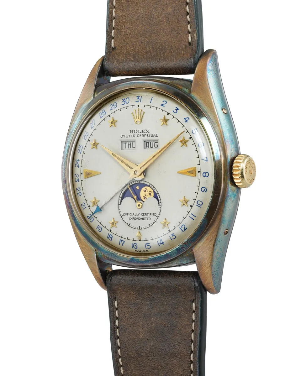 Rolex Ref. 6062 Stelline triple calendar moon phase in 18k yellow gold with star hour markers, circa 1952
