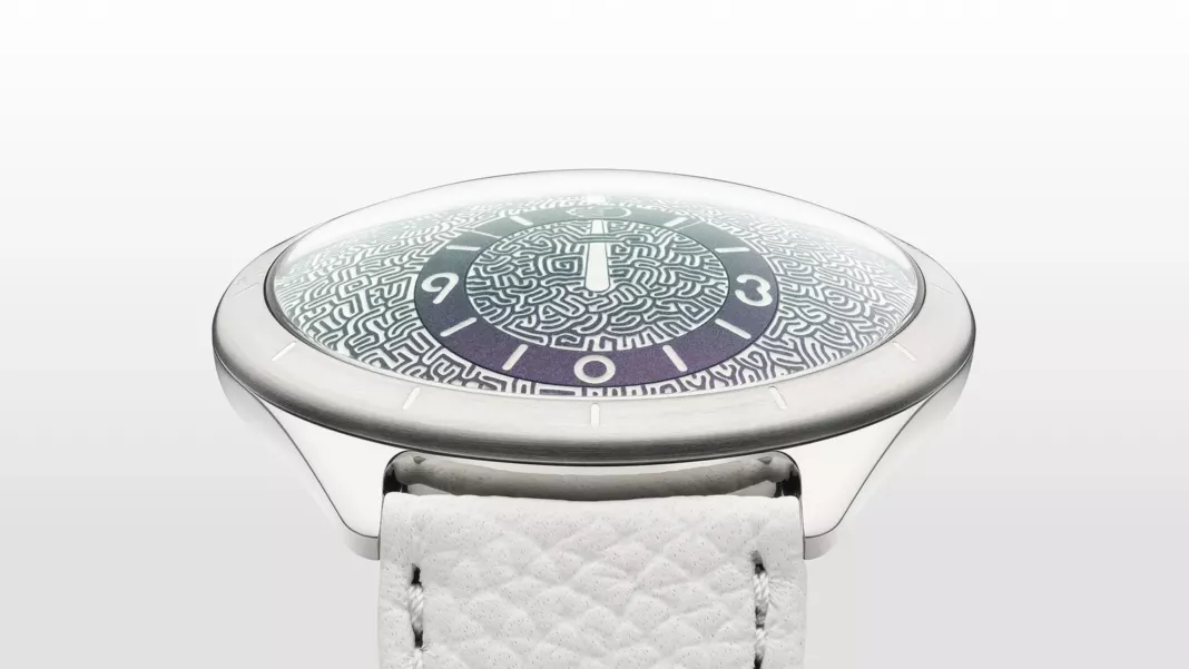 Ressence TYPE 9 Jules Wittock, side view of the engraved maze dial on a white leather strap
