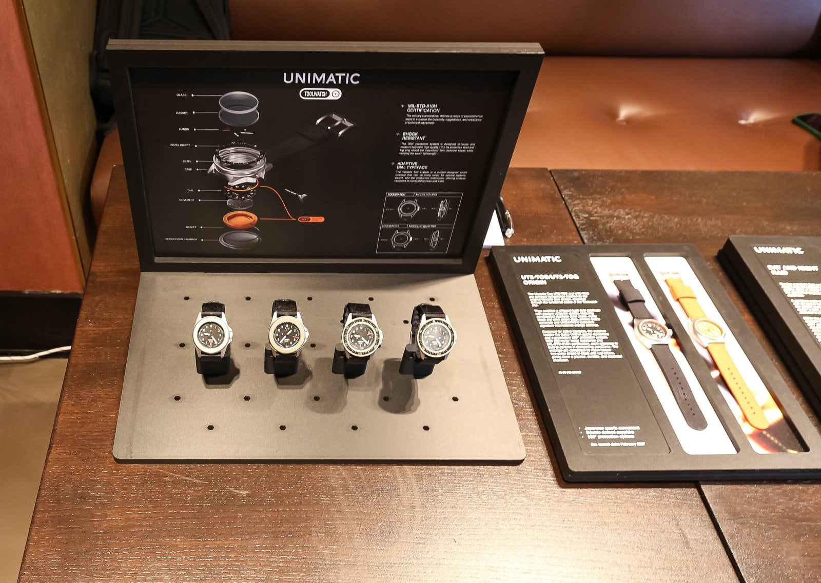 Unimatic display board with four watches and strap samples at Geneva Watch Days 2026