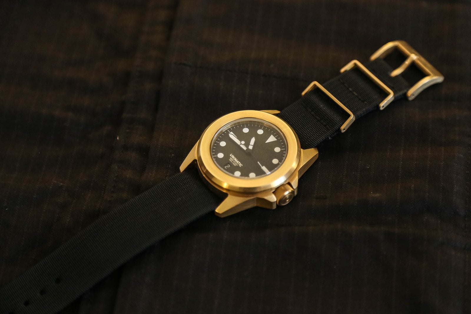 Unimatic Modello Quattro in solid gold with black dial on a black NATO strap, Giovanni Moro's own piece