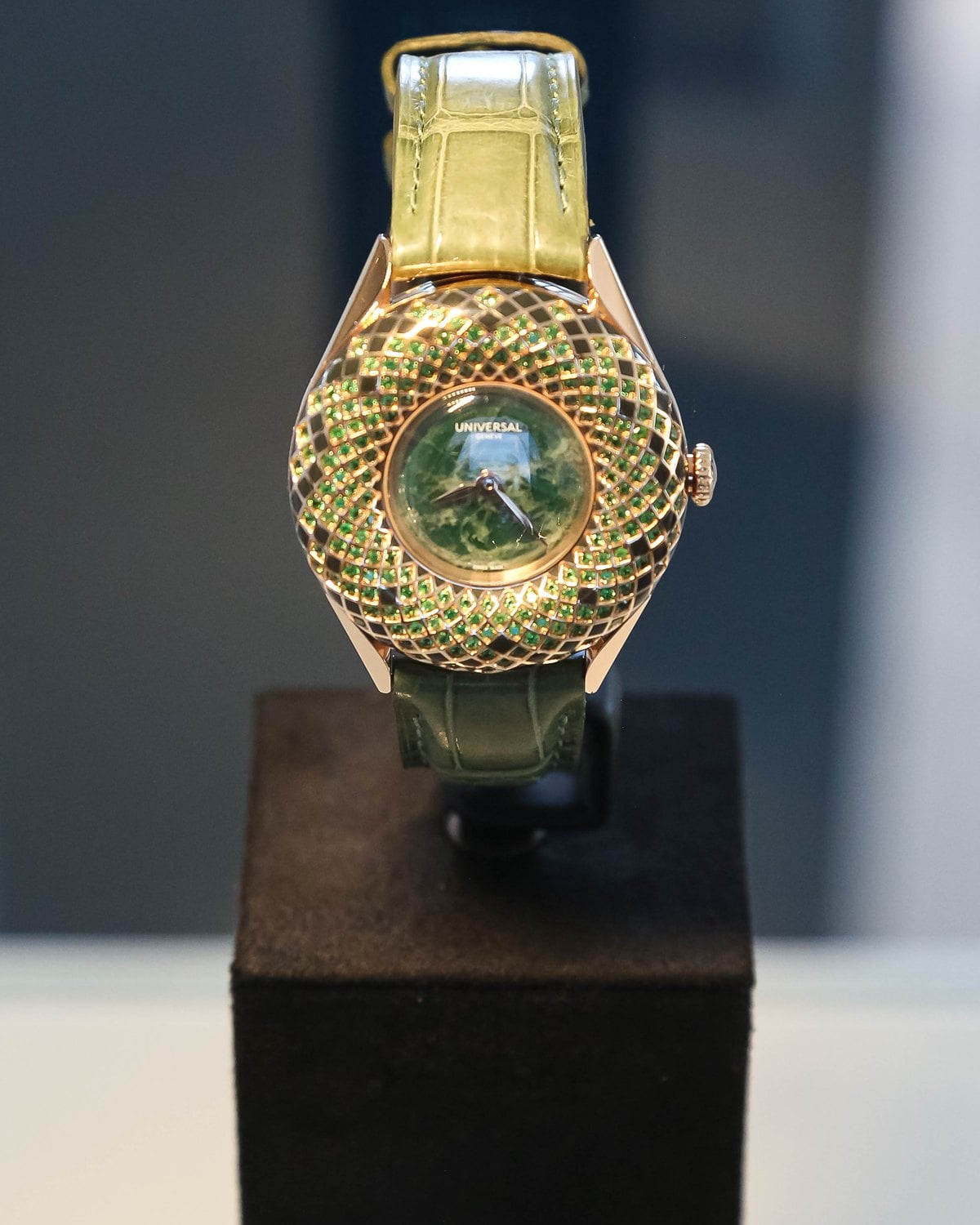 Universal Geneve Couture creation in green with engraved case and green strap at Geneva Watch Days 2026