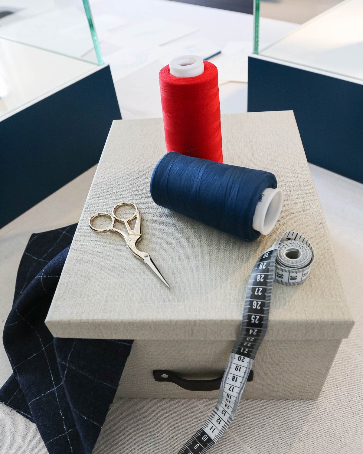 Couturier's thread, scissors and tape measure on the Universal Geneve stand at Geneva Watch Days 2026