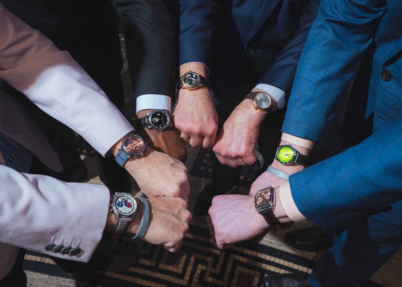 Collectors comparing their watches at WatchTime New York 2025