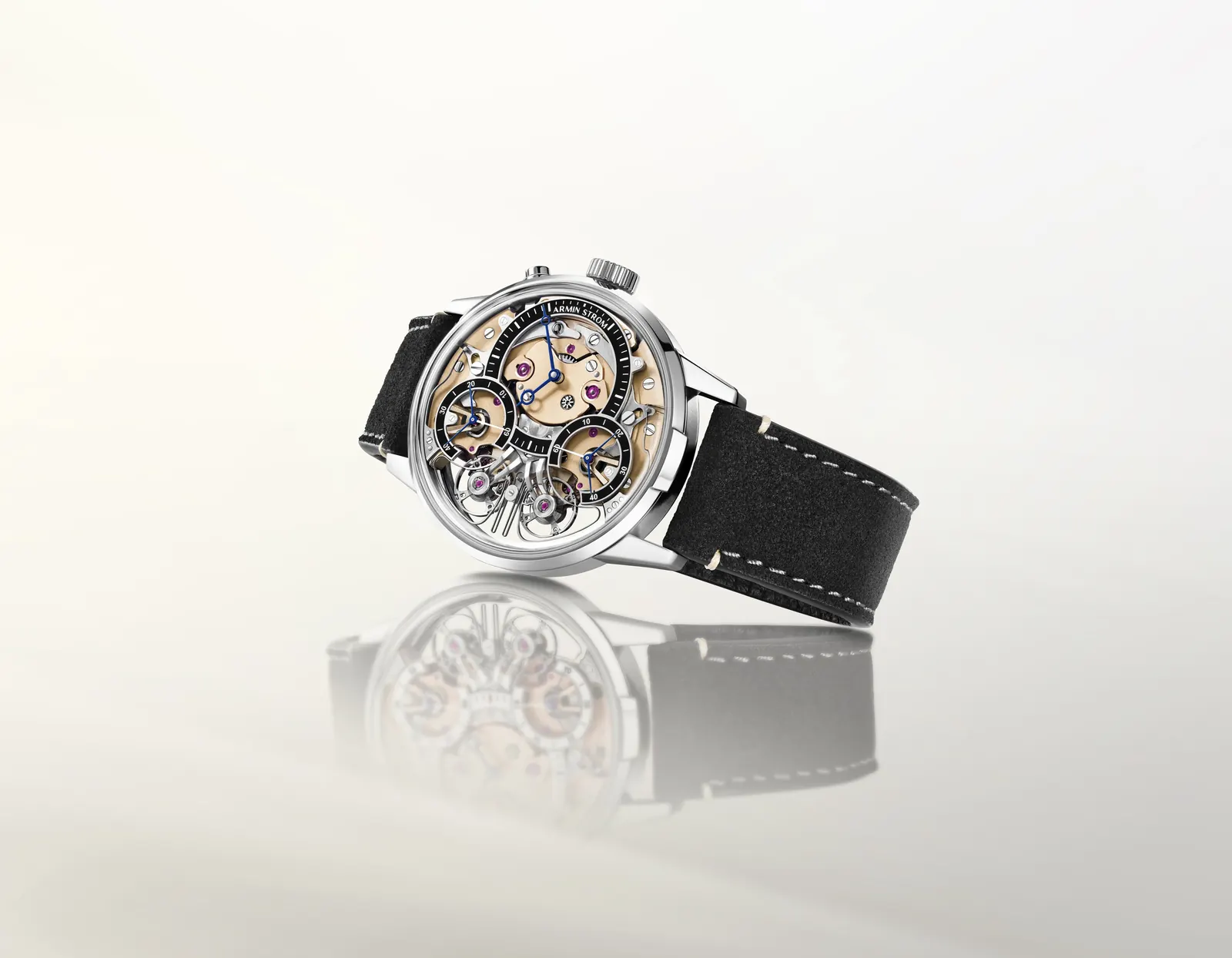 Armin Strom Mirrored Force Resonance Zeitgeist 1665 3N dial view showing 3N yellow-gold bridges and black lacquered chapter rings
