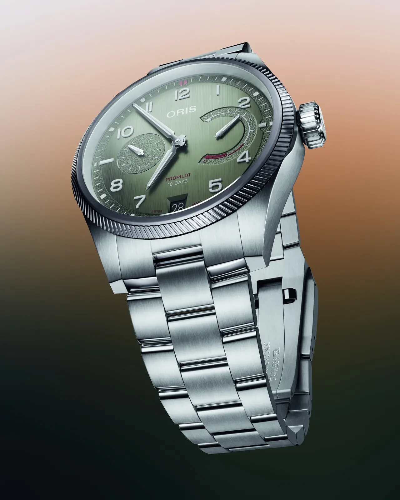 Oris ProPilot Calibre 111 pine green dial close-up showing textured surface and vertically brushed centre