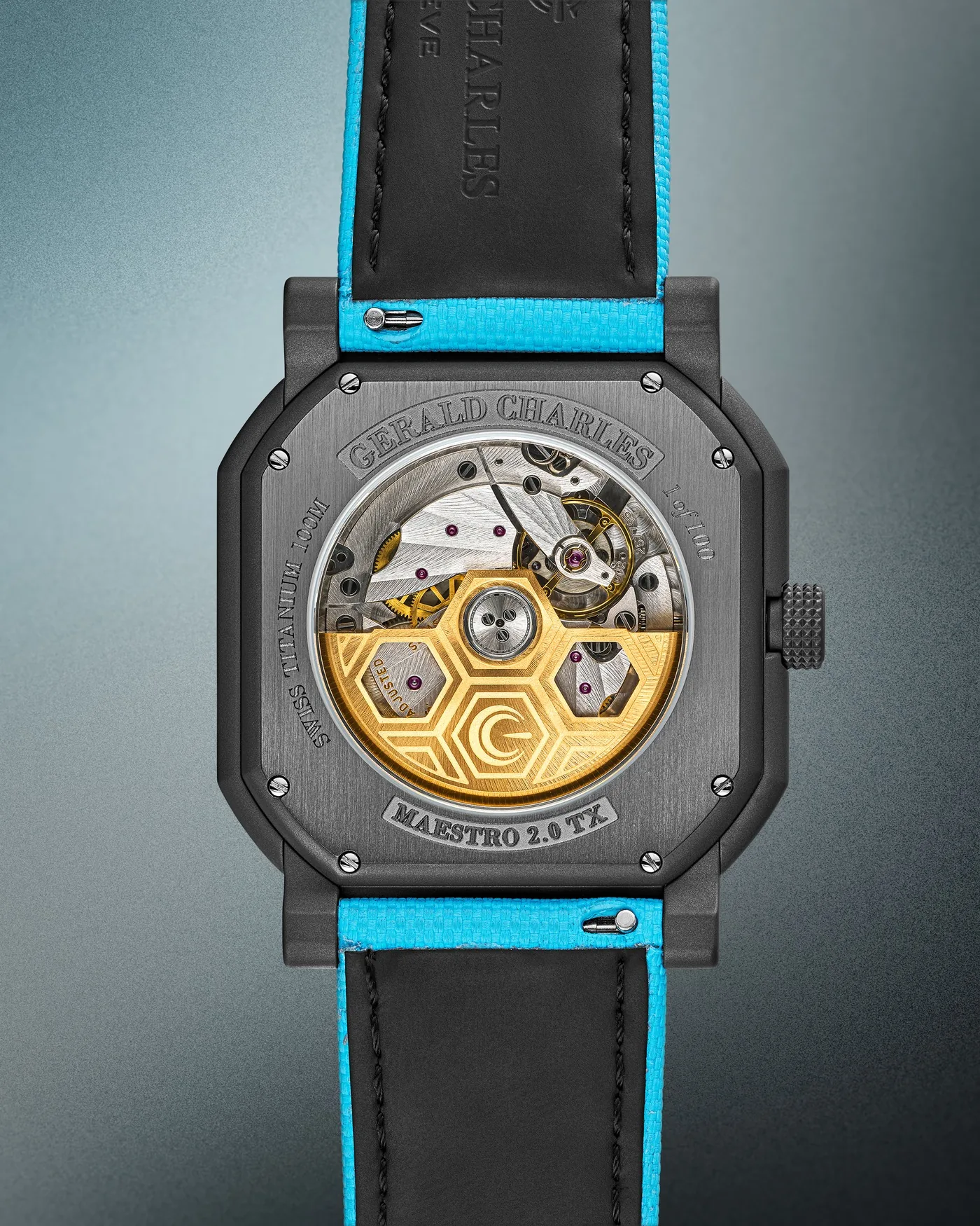 The caseback of the Gerald Charles Maestro GC Sport Tennis Turquoise, showing the movement and the gold rotor