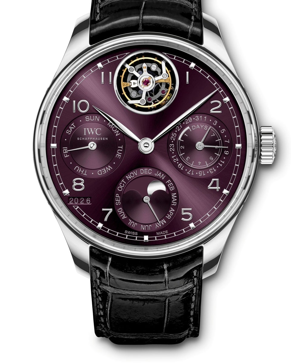 Purple sunray dial of the IWC Portugieser Perpetual Calendar Tourbillon with the flying minute tourbillon at 12 o'clock