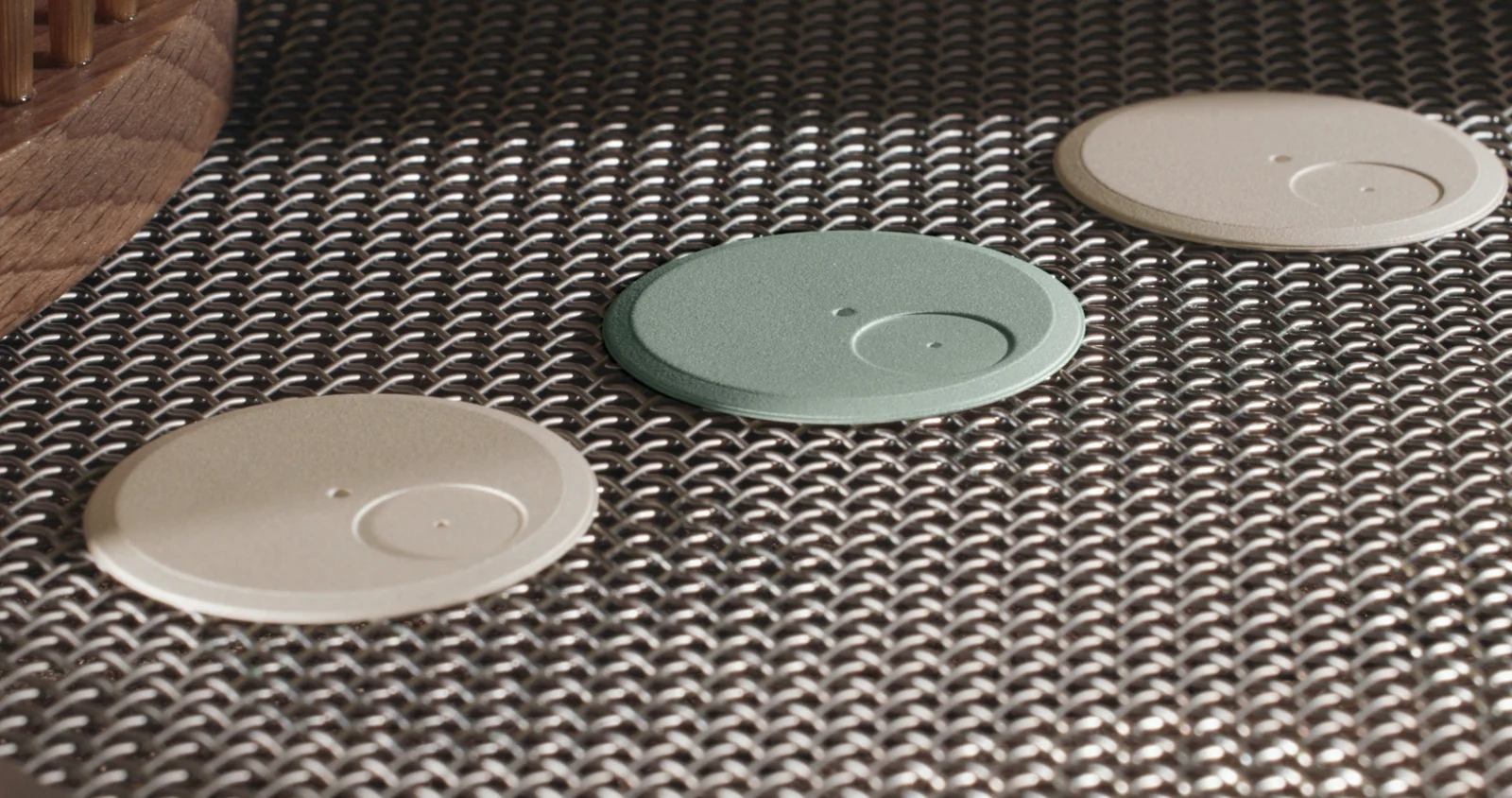 Hand-grained TORIC dials drying after grenage, one in Morning Blue